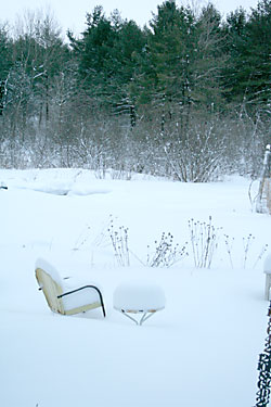 patio furniture under snow